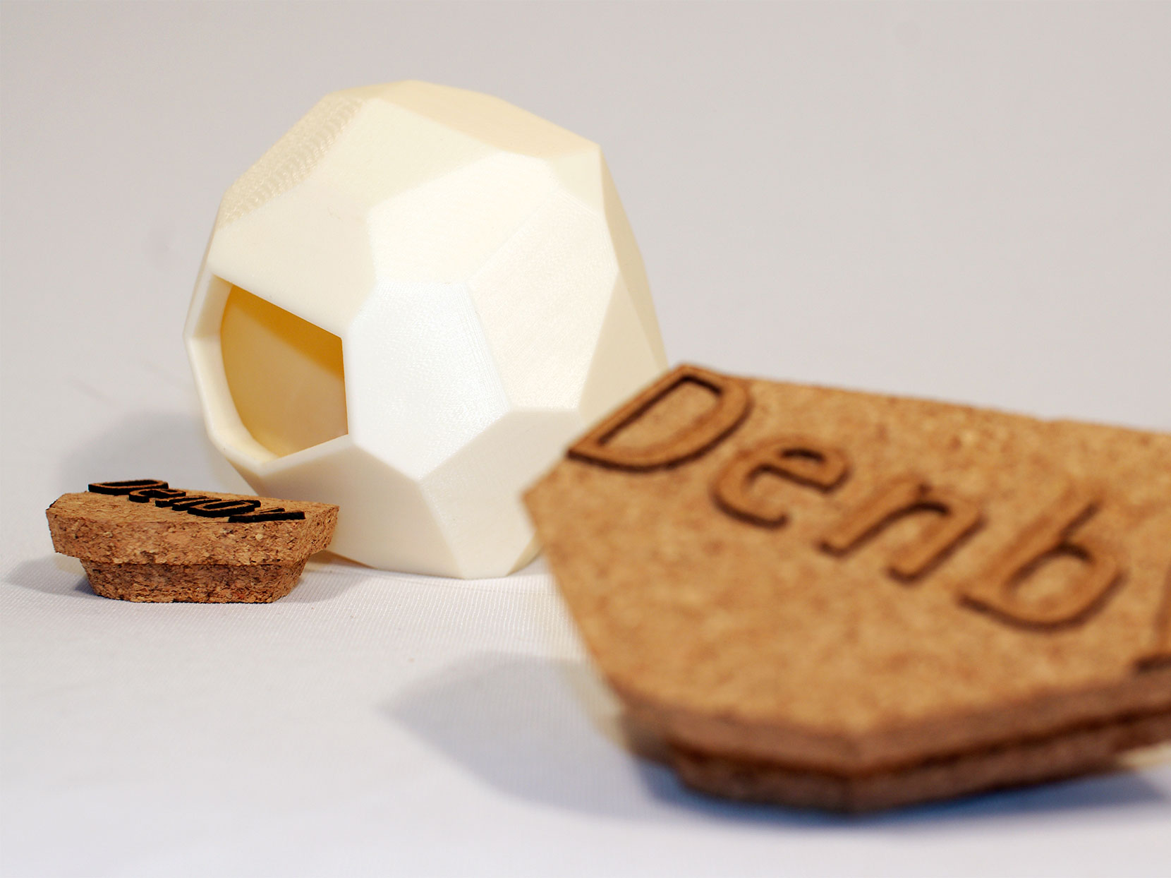 Denby Pottery biscuit barrel concept with faceted ceramic walls and thick cork lid